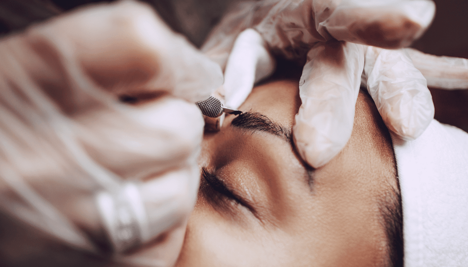 Esthetician performing microblading at Salon Kathleen in Enumclaw